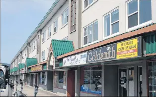  ?? JOE GIBBONS/THE TELEGRAM ?? Property management company Martek says commercial tenants should able to return to the Churchill Square complex later this fall, with residentia­l properties to follow in early 2018. The building was extensivel­y damaged during March’s windstorm and the...