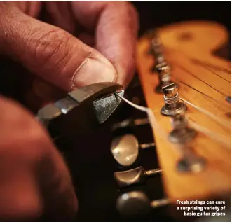  ??  ?? Fresh strings can cure a surprising variety of basic guitar gripes