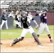  ?? MARK HUMPHREY ENTERPRISE-LEADER ?? Lincoln baseball coach Justin Bounds watches as the Wolves’ catcher Josh Jetton attempts to throw out a runner stealing second. Lincoln lost 15-1 to Gravette Thursday.