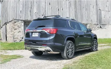  ?? PHOTOS: DEREK MCNAUGHTON / DRIVING.CA ?? The 2018 GMC Acadia Denali is about 15 centimetre­s shorter than the previous model and the 87-litre fuel tank displayed a range of more than 900 kilometres.