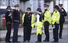  ??  ?? Police outside the home where the suspects were fostered