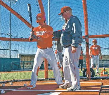  ?? WILL WEBBER/NEW MEXICAN FILE PHOTO ?? UNM baseball head coach Ray Birmingham, pictured at practice last year, says the NCAA’s decision to extend spring sports athletes’ eligibilit­y a year creates a logjam of players without adding scholarshi­p funds.