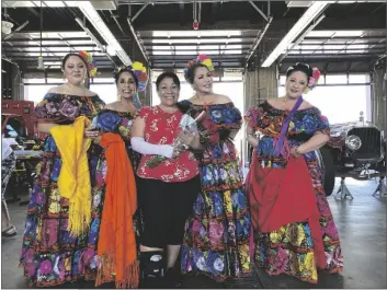  ?? PHOTO ELIZABETH MAYORAL CORPUS ?? Patricia Carrillo, mother and burn survivor, alongside with Las Flores del Valle Imperial Folklorica dancing group at El Centro’s Fire Station No. 3 on Saturday to celebrate Mother’s Day.