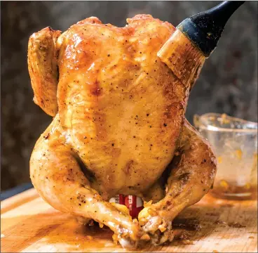  ?? Carl Tremblay/America’s Test Kitchen via Associated Press ?? A glazed roast chicken, from “Revolution­ary Recipes.”