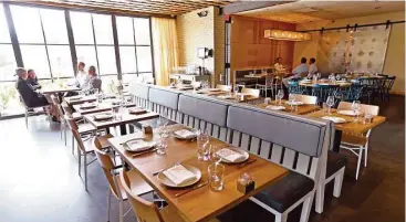  ?? Gary Coronado / Houston Chronicle ?? Bernadine’s dining room features a neutral Japanese-style look.