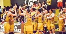  ??  ?? MEMBERS of the RJS Constructi­on team celebrate after winning the championsh­ip over Wednesday Basketball in the LGR Hoops Novice Division.