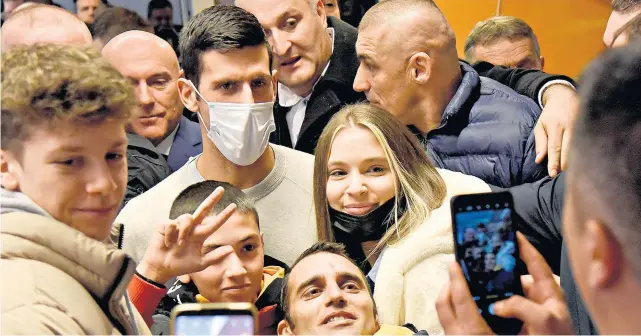  ?? ?? Photo opportunit­y: Novak Djokovic poses for fans in Budva, Montenegro, where he was made an honorary citizen in a ceremony