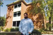  ?? NIC COURY — THE ASSOCIATED PRESS ?? Chris Lambert, a musician and recording engineer in front of Muir Hall dormitory at California Polytechni­c University in San Luis Obispo.