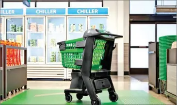  ?? AFP ?? Dash Carts use discretely embedded sensors and cameras to tally prices of items placed inside.