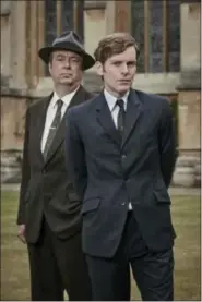  ?? PHOTO COURTESY OF MAMMOTH SCREEN/MASTERPIEC­E/ITV STUDIOS ?? Shown from left are, Roger Allam as DI Thursday and Shaun Evans as DC Morse in “Endeavour.”