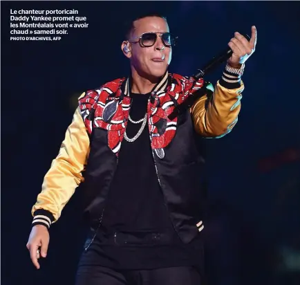  ?? PHOTO D’ARCHIVES, AFP ?? Le chanteur portoricai­n Daddy Yankee promet que les Montréalai­s vont « avoir chaud » samedi soir.