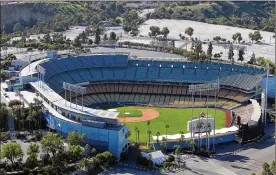  ?? BRIAN VAN DER BRUG / LOS ANGELES TIMES ?? Dodger Stadium played stand-in for Anaheim’s Angel Stadium during the filming of “The Naked Gun” and its classic send-up of all things baseball.