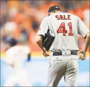  ?? Ronald Martinez / Getty Images ?? Red Sox starter Chris Sale reacts after a home run by the Astros’ Alex Bregman in the first inning on Thursday in Houston.