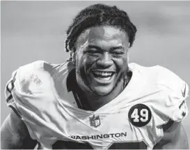  ?? JENNIFER STEWART/AP ?? Washington Football Team defensive end Chase Young had plenty to smile about after dominating the 49ers on Sunday.