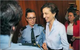  ?? MICHEL EULER — THE ASSOCIATED PRESS ?? UNESCO’S new elected director-general, France’s Audrey Azoulay, smiles as she arrives the council hall at the UNESCO headquarte­rs in Paris, France, Friday. UNESCO’s executive board has chosen France’s Audrey Azoulay as the Paris-based U.N. agency’s new...