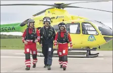  ?? Photograph: Graeme Hart/Perthshire Picture Agency. ?? Scotland’s Charity Air Ambulance (SCAA) marked its tenth anniversar­y on Monday May 22. Left to right: day duty crew - lead paramedic John Pritchard, pilot Captain Russell Myles and paramedic Ali Daw.