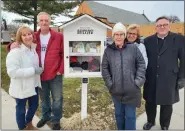  ?? SUSAN SMILEY — THE MACOMB DAILY ?? Sharon and Gregg Monbleau (left), Sharon Bronson, Debra Goff-Liegghio and Father John Maksym at the new hygiene blessing box in Mount Clemens.