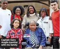  ?? ?? Captain Gary Anglin (centre) with his family