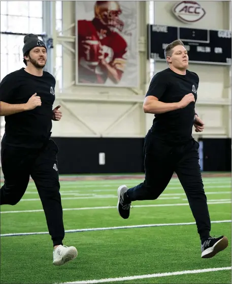  ?? MADDIE MALHOTRA — BOSTON RED SOX ?? Newly acquired Red Sox pitchers Justin Slaten, left, and Richard Fitts participat­e in a workout as part of the club’s Rookie Developmen­t Program.