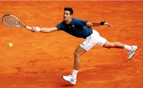  ?? CLIVE BRUNSKILL/GETTY IMAGES ?? Novak Djokovic plays a shot at the Monte Carlo Masters, where he lives an extremely privileged tax-free lifestyle.