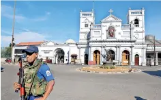  ??  ?? Security outside St. Anthony's Church