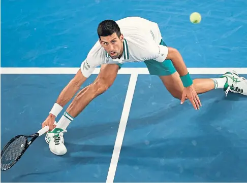  ??  ?? EYES ON THE PRIZE: Novak Djokovic of Serbia during his semi-final win over Russian qualifier Aslan Karatsev.