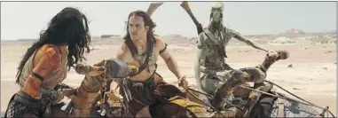  ??  ?? John Carter features ( from left) Lynn Collins ( Dejah Thoris); Canadian actor Taylor Kitsch ( John Carter), Samantha Morton ( Sola).