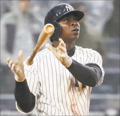  ?? Kathy Willens / Associated Press ?? The Yankees’ Didi Gregorius watches his three-run home run, his second of the day, in the seventh inning against the Rays on Tuesday in New York.