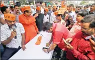  ?? IANS ?? BJP leader R.K. Sinha during the party’s membership drive, in Patna on Wednesday.