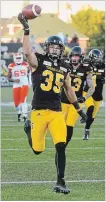  ?? THE HAMILTON SPECTATOR ?? Ticats safety Mike Daly celebrates his touchdown against B.C. on Sept. 29.