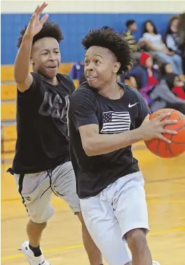  ?? STAFF PHOTO BY JOHN WILCOX ?? DOUBLE TROULE: New Mission seniors Charles (left) and Charlie Mitchell are seeking the program’s third state title in four seasons.