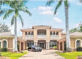  ?? SUN SENTINEL ?? The 6,295-square-foot, two-story estate, at 12529 S. Stonebrook Circle, is located within the gated Stonebrook Estates neighborho­od.