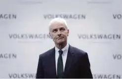  ??  ?? WOLFSBURG: In this file photo Matthias Mueller, CEO of Volkswagen, looks up as he arrives for a press conference of the German Volkswagen company in Wolfsburg, Germany. —AP