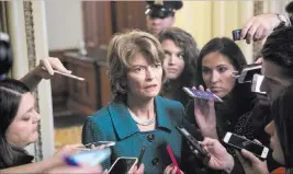  ?? J. Scott Applewhite ?? The Associated Press Republican Sen. Lisa Murkowski of Alaska speaks with reporters Friday at the Capitol.