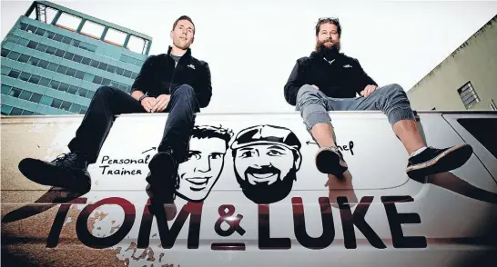  ?? Photo: MAARTEN HOLL/FAIRFAX NZ ?? On top of the world: Tom & Luke health food business owners Tom Dorman, 29, and Luke Cooper, 33, aim to make Wellington healthier one bite at a time.