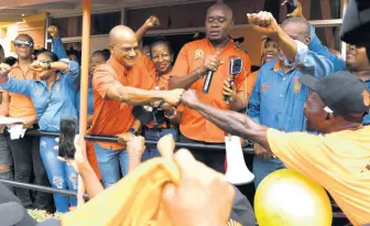  ?? RICARDO MAKYN/CHIEF PHOTO EDITOR ?? PNP presidenti­al challenger Peter Bunting greets supporters following his nomination for the September 7 election last week. He will face incumbent Dr Peter Phillips in the run-off at a special delegates’ conference.