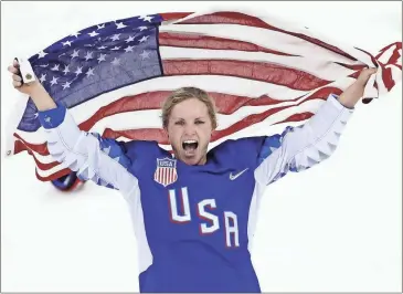  ?? Matt Slocum / AP ?? Jocelyne Lamoureux-Davidson of the United States celebrates after winning against Canada in the women’s gold medal hockey game at the Winter Olympics in Gangneung, South Korea. The team won 3-2 in a shootout.