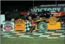  ?? RICH KEPNER - FOR DIGITAL FIRST MEDIA ?? Chuck Schutz celebrates after his Late Model win at Grandview on Sept. 1.