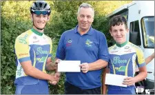  ??  ?? Drogheda Wheelers chairperso­n Andrew Watters makes a presentati­on to Ben McCourt Lenehan and James McMorrow who are riding in the Junior Tour of Ireland.