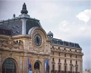  ??  ?? PARIS: Photo shows the Orsay museum and the Eiffel tower in Paris. One of the most densely populated museums in the world, located in an old station and dedicated to a short and turbulent artistic period: Orsay celebrates its 30th anniversar­y this...