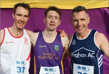  ??  ?? The men’s medal winners (from left): Paul Flanagan (D.M.P., second), Denis Whelan (Slaney Olympic, first), Alex Williams (Croghan, third).