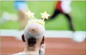  ?? PICTURE: REUTERS ?? A man watches runners compete at the Gay Games VIII in Cologne, Germany, in 2010.