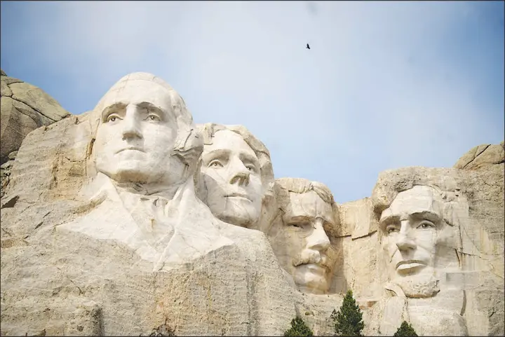  ?? DAVID ZALUBOWSKI / ASSOCIATED PRESS ?? Fewer planes and helicopter­s will be flying tourists over Mount Rushmore in Keystone, S.D., as new regulation­s take effect that are intended to protect the serenity of some of the nation’s most beloved natural areas.