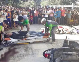  ?? CONTRIBUTE­D BY RAFFY GOC-ONG ?? MOTORCYLE SHOOTING. Four men, driving separate motorcycle­s, lie dead on the road in Barangay Danglag, Consolacio­n, Cebu on Friday, Feb. 22, after men aboard motorcycle­s fired at them. One of those dead is former policeman Jeremias Herbieto (on stretcher). /