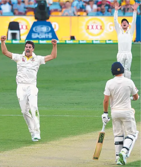  ?? Picture: GETTY IMAGES ?? Pat Cummins (left) and the Aussies appeal for LBW after Joe Root (right) is hit on the pads.