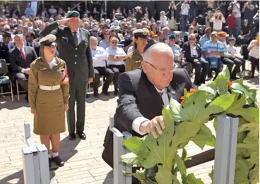  ?? Photo: Reuters ?? Israeli President Reuven Rivlin lays a wreath during a ceremony marking the annual Holocaust Remembranc­e Day at the Yad Vashem Holocaust memorial in Jerusalem.