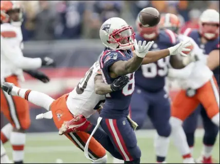  ?? Tribune News Service ?? New England’s Kendrick Bourne misses a pass defended by Cleveland’s Greg Newsome II in the first half Sunday in Foxborough, Maass. Newsome was called for pass interferen­ce on the play.