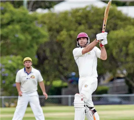  ?? Photo: Nev Madsen ?? OVER THE FENCE: Chris Gillam admires his work during the Harding-Madsen Shield final between Western Districts and Northern Brothers Diggers.