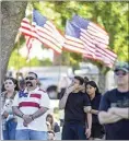  ?? ?? Members of the crowd listen to guest speakers at the Memorial Day service held Monday morning at Historic Union Cemetery in east Bakersfiel­d.