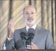  ?? MEDIANEWS GROUP FILE PHOTO ?? Gov. Tom Wolf says the state’s coronaviru­s percent positivity rate decreased this week, a sign that Pennsylvan­ians are uniting against the virus.